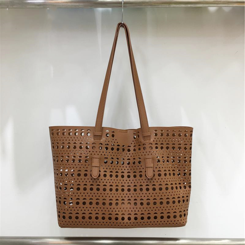 Elegant Hollow Carved Tote Bag - High-End Large Capacity Handbag with Detachable Pouch for Spring/Summer Fashion Elegant Hollow Carved Tote Bag - High-End Large Capacity Handbag with Detachable Pouch for Spring/Summer Fashion
