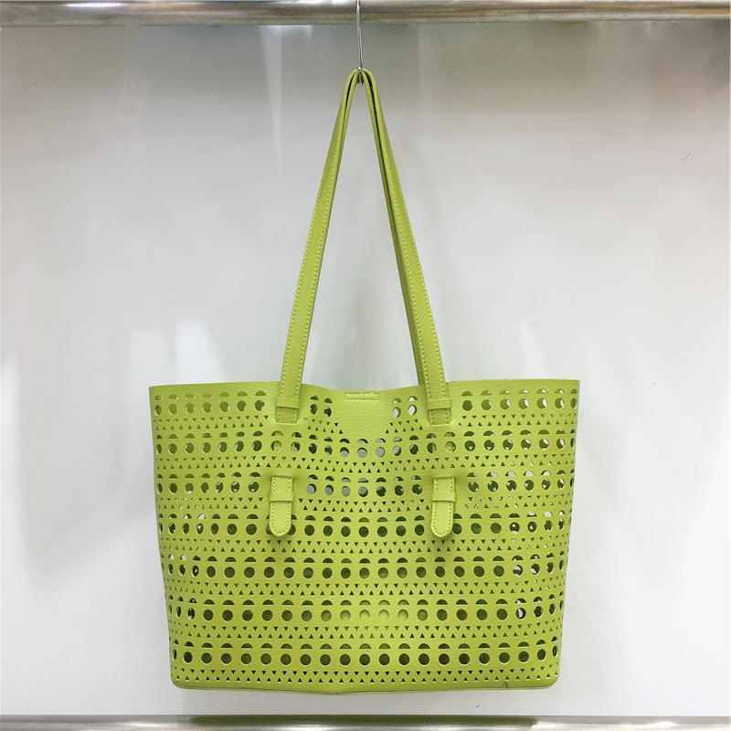 Elegant Hollow Carved Tote Bag - High-End Large Capacity Handbag with Detachable Pouch for Spring/Summer Fashion Elegant Hollow Carved Tote Bag - High-End Large Capacity Handbag with Detachable Pouch for Spring/Summer Fashion