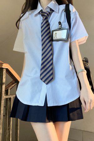 Four-Piece JK Uniform Set for Women: Striped Long Sleeve Shirt, Loose Fit, Pleated Skirt - Trendy 2024 Autumn Style