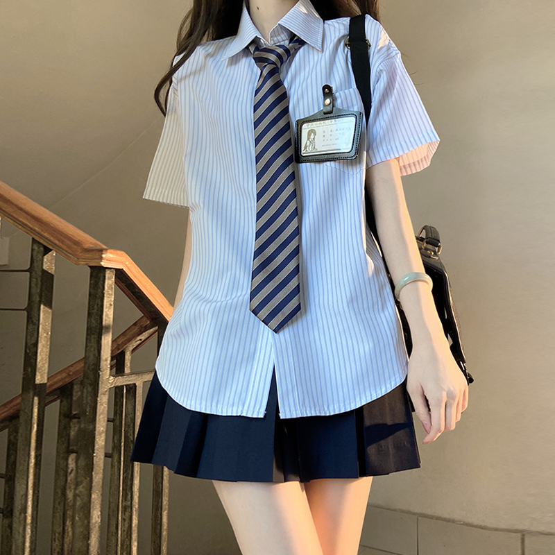 Four-Piece JK Uniform Set for Women: Striped Long Sleeve Shirt, Loose Fit, Pleated Skirt - Trendy 2024 Autumn Style Four-Piece JK Uniform Set for Women: Striped Long Sleeve Shirt, Loose Fit, Pleated Skirt - Trendy 2024 Autumn Style