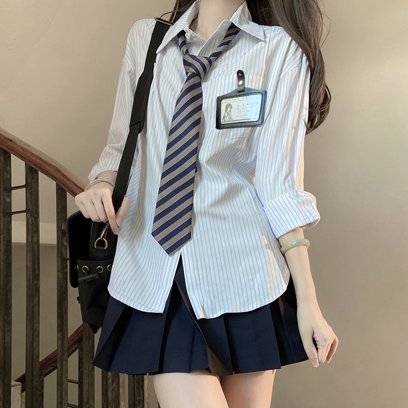 Four-Piece JK Uniform Set for Women: Striped Long Sleeve Shirt, Loose Fit, Pleated Skirt - Trendy 2024 Autumn Style Four-Piece JK Uniform Set for Women: Striped Long Sleeve Shirt, Loose Fit, Pleated Skirt - Trendy 2024 Autumn Style