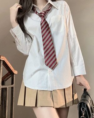 Four-Piece JK Uniform Set for Women: Striped Long Sleeve Shirt, Loose Fit, Pleated Skirt - Trendy 2024 Autumn Style