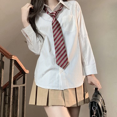 Four-Piece JK Uniform Set for Women: Striped Long Sleeve Shirt, Loose Fit, Pleated Skirt - Trendy 2024 Autumn Style Four-Piece JK Uniform Set for Women: Striped Long Sleeve Shirt, Loose Fit, Pleated Skirt - Trendy 2024 Autumn Style