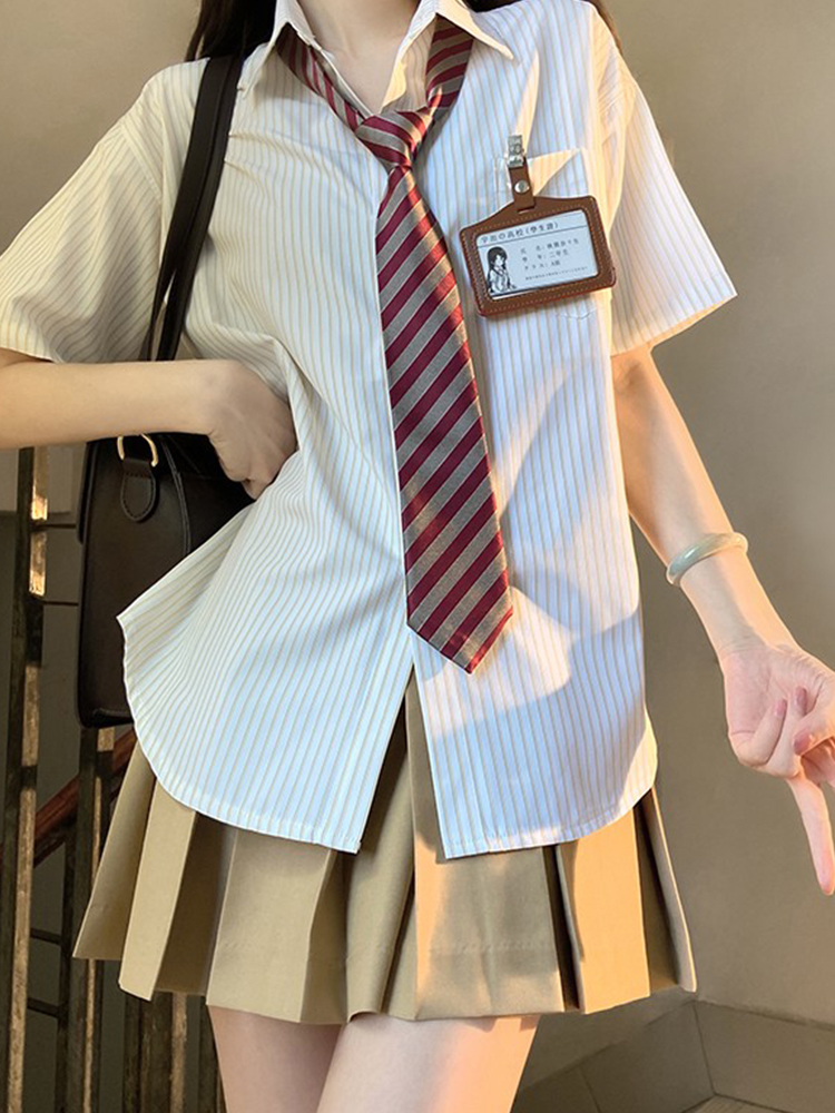 Four-Piece JK Uniform Set for Women: Striped Long Sleeve Shirt, Loose Fit, Pleated Skirt - Trendy 2024 Autumn Style Four-Piece JK Uniform Set for Women: Striped Long Sleeve Shirt, Loose Fit, Pleated Skirt - Trendy 2024 Autumn Style