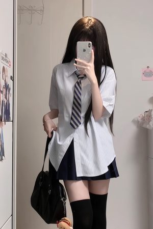 Four-Piece JK Uniform Set for Women: Striped Long Sleeve Shirt, Loose Fit, Pleated Skirt - Trendy 2024 Autumn Style
