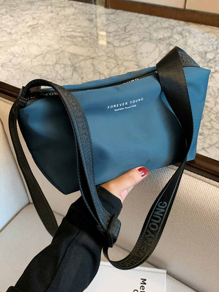 High-End Lightweight Nylon Crossbody Bag for Women - Portable Commuting Travel Style with Wide Strap High-End Lightweight Nylon Crossbody Bag for Women - Portable Commuting Travel Style with Wide Strap