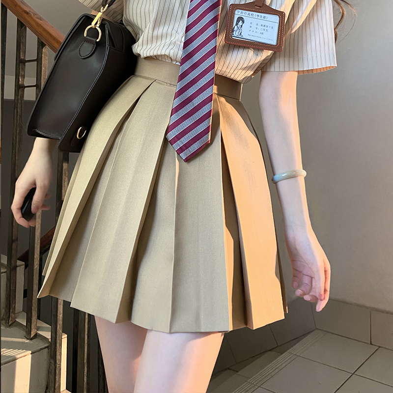 High-Waisted Pleated JK Uniform Skirt in Plaid - Solid Color Basic Style, Authentic 90s-Inspired Pudding Bear Aesthetic High-Waisted Pleated JK Uniform Skirt in Plaid - Solid Color Basic Style, Authentic 90s-Inspired Pudding Bear Aesthetic
