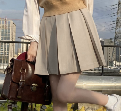 High-Waisted Pleated JK Uniform Skirt in Plaid - Solid Color Basic Style, Authentic 90s-Inspired Pudding Bear Aesthetic High-Waisted Pleated JK Uniform Skirt in Plaid - Solid Color Basic Style, Authentic 90s-Inspired Pudding Bear Aesthetic