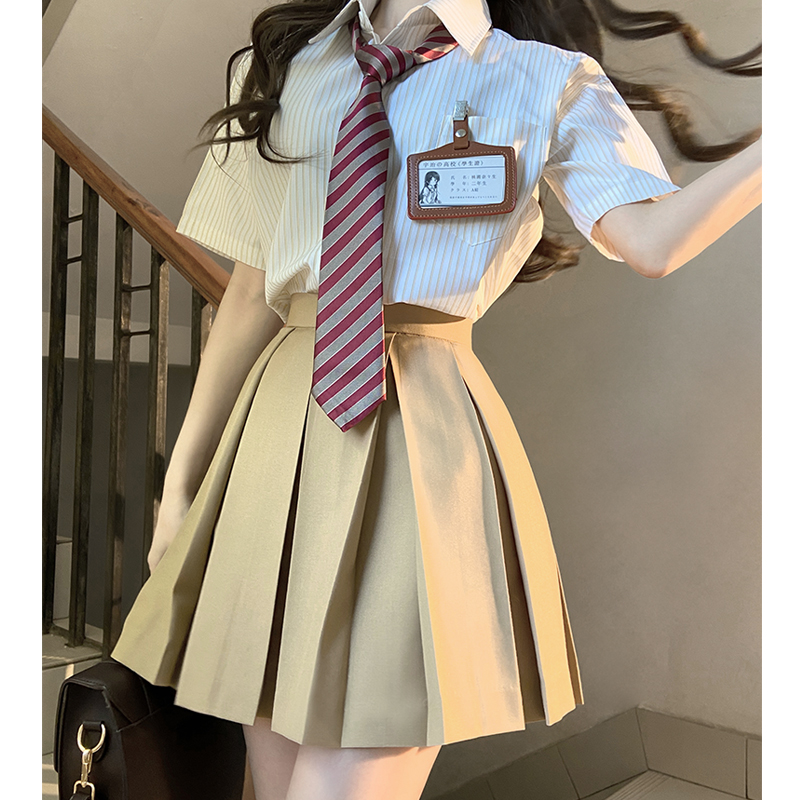 High-Waisted Pleated JK Uniform Skirt in Plaid - Solid Color Basic Style, Authentic 90s-Inspired Pudding Bear Aesthetic High-Waisted Pleated JK Uniform Skirt in Plaid - Solid Color Basic Style, Authentic 90s-Inspired Pudding Bear Aesthetic