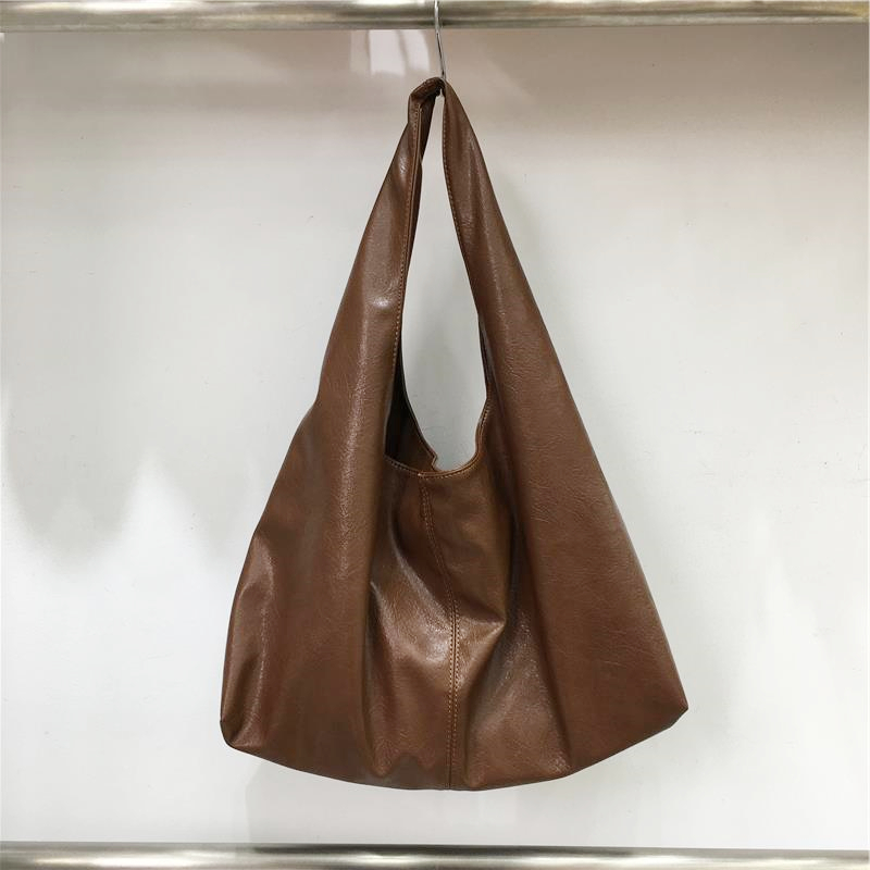 Korean Style Minimalist Large Capacity Tote Bag in High-Quality Silver Oil Wax Leather – Stylish Handheld Shoulder Bag for Everyday Use Korean Style Minimalist Large Capacity Tote Bag in High-Quality Silver Oil Wax Leather – Stylish Handheld Shoulder Bag for Everyday Use