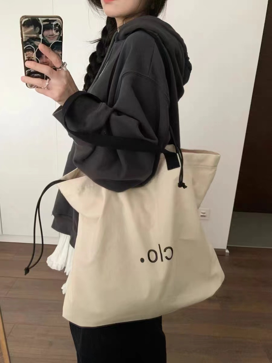 Large Capacity Canvas Drawstring Tote Bag for Commuting, Fresh Korean Style Minimalist Design with Letter Print Large Capacity Canvas Drawstring Tote Bag for Commuting, Fresh Korean Style Minimalist Design with Letter Print