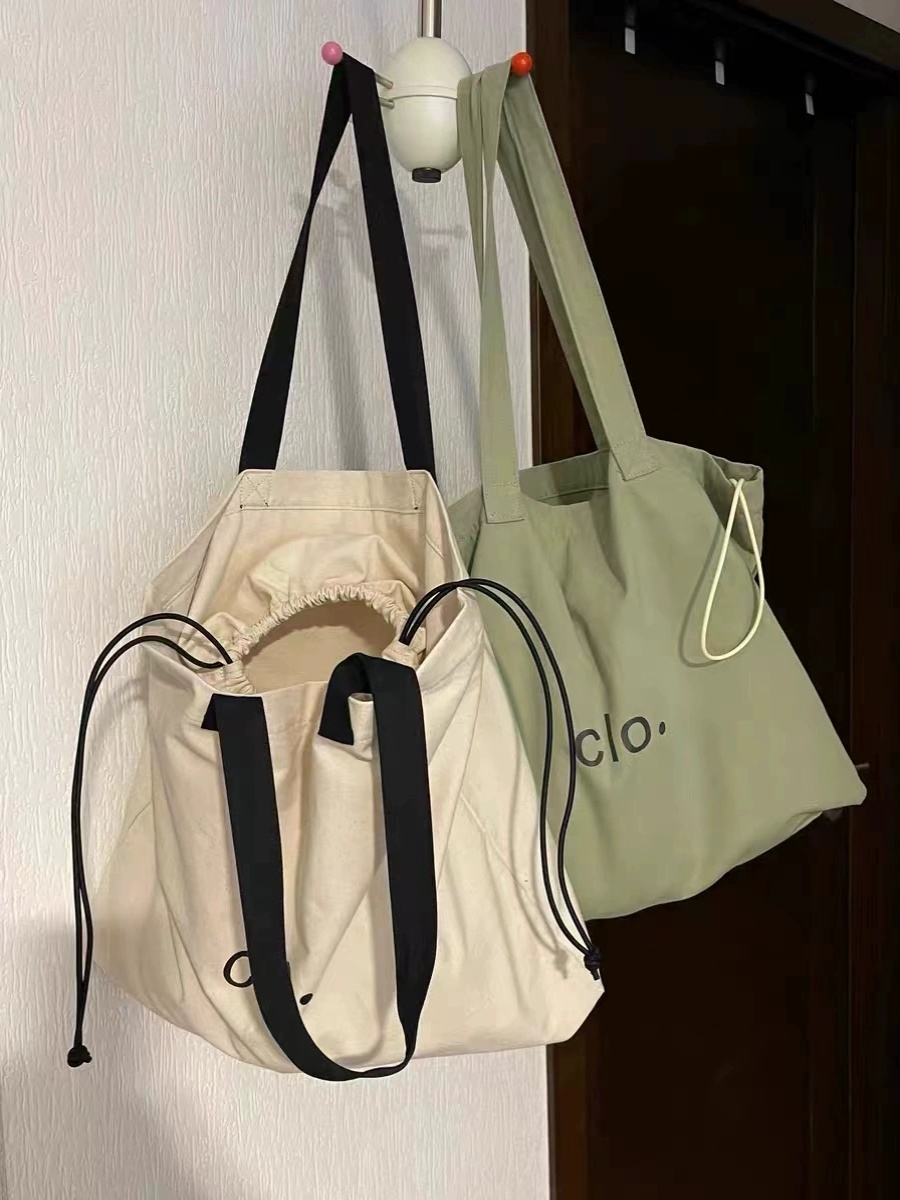 Large Capacity Canvas Drawstring Tote Bag for Commuting, Fresh Korean Style Minimalist Design with Letter Print Large Capacity Canvas Drawstring Tote Bag for Commuting, Fresh Korean Style Minimalist Design with Letter Print