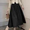 Mid-Length A-Line Umbrella Skirt with Flower Bud Patchwork, High-Waisted Black and White Hepburn Style for Spring and Summer