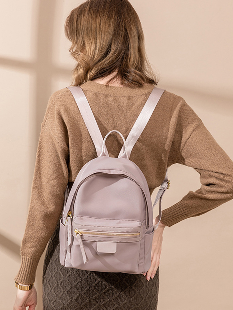 Minimalist Water-Resistant Backpack for Women, Versatile Commuting Book Bag, Stylish Small Backpack for Everyday Use Minimalist Water-Resistant Backpack for Women, Versatile Commuting Book Bag, Stylish Small Backpack for Everyday Use