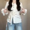 Plus-Size Women's Long Sleeve Shirt - French Design, Irregular Waist, Flattering Spring Top for Curvy Figures, Chic Fashion.