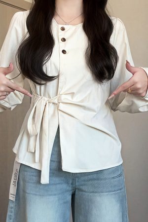 Plus-Size Women's Long Sleeve Shirt - French Design, Irregular Waist, Flattering Spring Top for Curvy Figures, Chic Fashion.