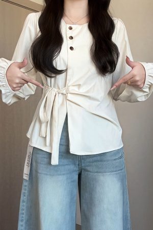 Plus-Size Women's Long Sleeve Shirt - French Design, Irregular Waist, Flattering Spring Top for Curvy Figures, Chic Fashion.