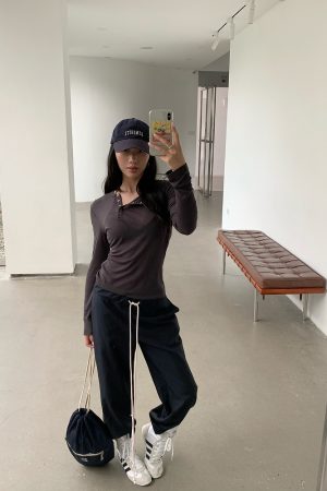 Rebellious Aesthetics Slanted Buckle Design Tencel Tee - Nonconformist Style, 90s Inspired Fashion Top