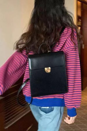 Retro Casual Black Leather Backpack for Women - Minimalist Travel Commuter Bag with Artistic Design