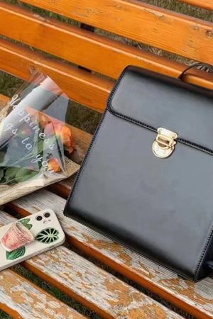 Retro Casual Black Leather Backpack for Women - Minimalist Travel Commuter Bag with Artistic Design