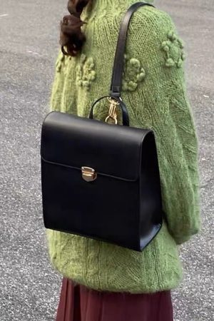 Retro Casual Black Leather Backpack for Women - Minimalist Travel Commuter Bag with Artistic Design