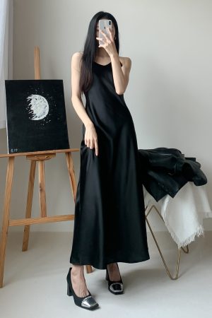 Silk Satin A-Line Slip Dress with Diagonal Cut and Flowing Thin Straps â€“ Elegant Long Black Dress for Effortless Style