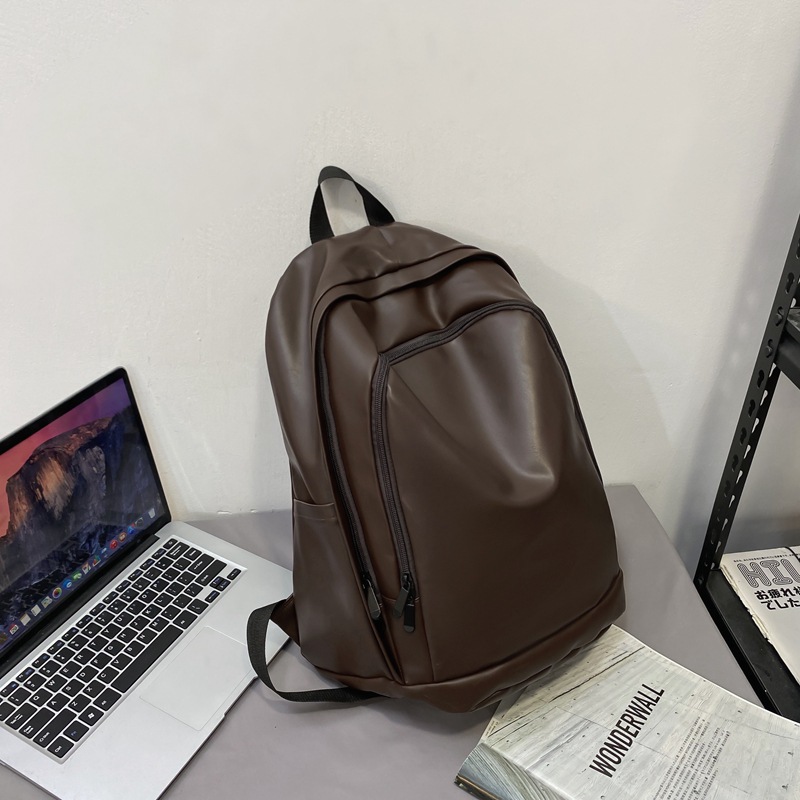 Trendy Water-Resistant Soft Leather Backpack for Men and Women - Large Capacity Minimalist College Campus Bag Trendy Water-Resistant Soft Leather Backpack for Men and Women - Large Capacity Minimalist College Campus Bag