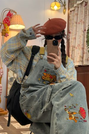 Vintage Washed Blue Denim Overalls Unisex Retro Jumpsuit for a Playful 90s Style Look - Versatile Fashion Essential