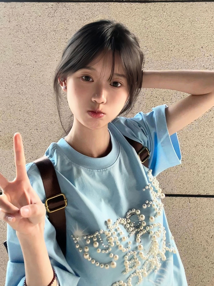 Women's Oversized Blue Heavyweight T-Shirt - American College Style with Pearl Letter Detail, Short Sleeve, Round Neck Women's Oversized Blue Heavyweight T-Shirt - American College Style with Pearl Letter Detail, Short Sleeve, Round Neck